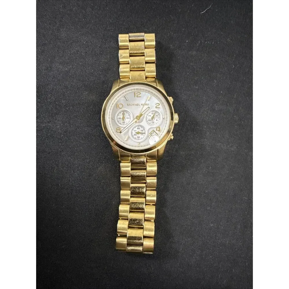 Michael Kors up auction